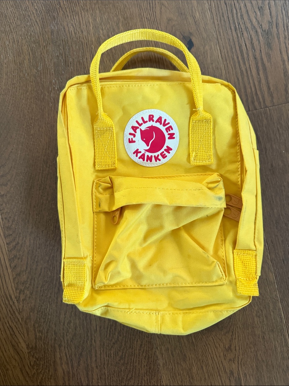 Fjallraven Kanken Mini Backpack in Yellow with Red Logo